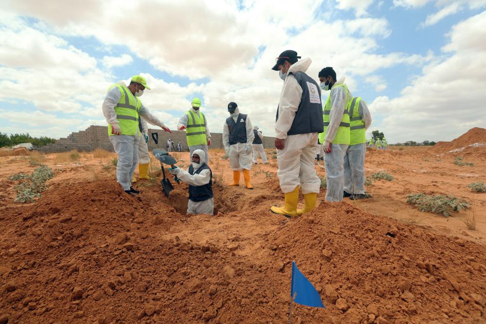 The Weekend Leader - 6 bodies recovered from mass graves in Libya